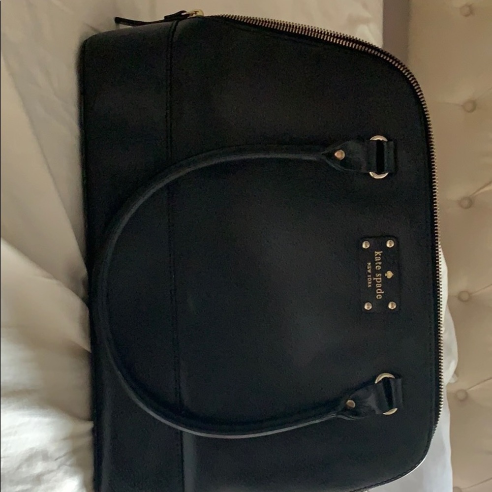 Black leather Kate Spade bag and wristlet.